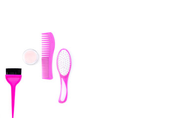 Professional hairdressing tools in beauty saloon. Combs, brushes on white background top view copy space