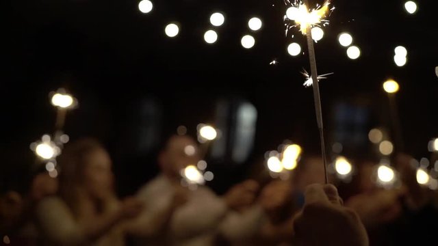 People with sparkles fire slowmotion