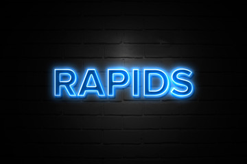 Rapids neon Sign on brickwall