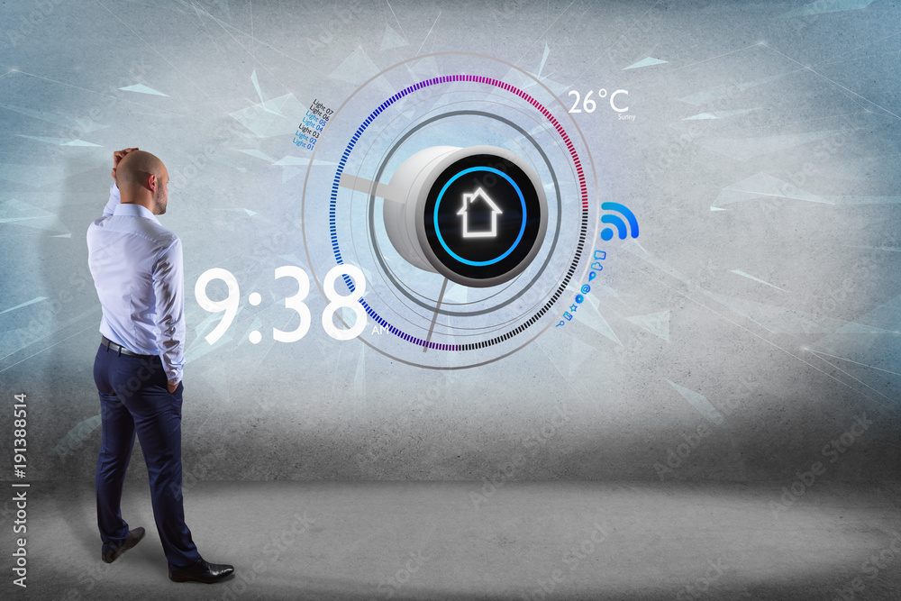 Poster businessman in front of a wall with a button of a smart home automation app - 3d rendering