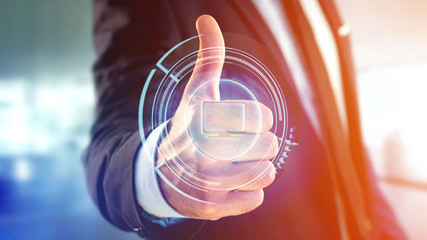 Businessman holding a Shinny technologic computer button - 3d render