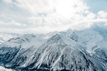 Obraz premium Snow-capped peaks of the Caucasus Mountains. Caucasian landscape