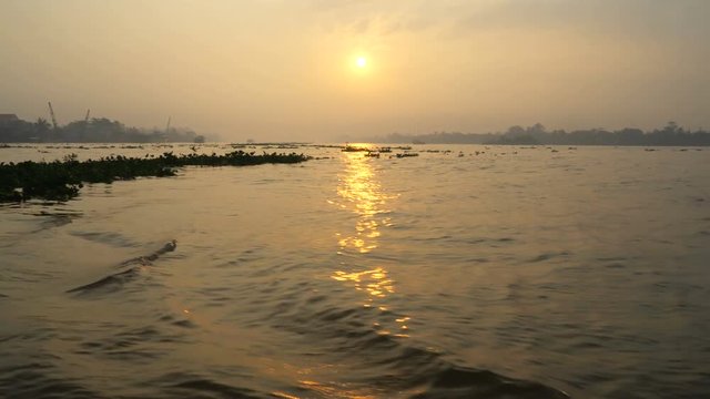 Sunrise on the Mekong River in southern Vietnam.