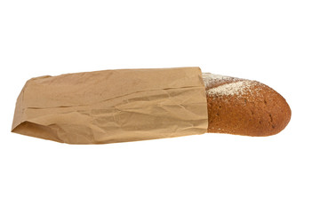 black bread in a paper bag isolated on a white background