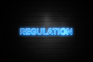 Regulation neon Sign on brickwall