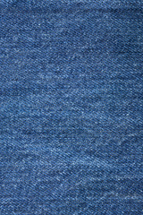 Naklejka premium The blue rude jeans closeup for background