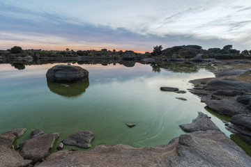 Sunset in the natural area of the Barruecos. Spain.