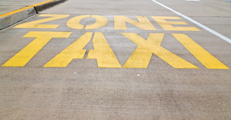  the line painted  in the asphalt for    taxy zone