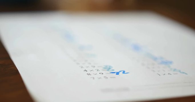 Math Homework on Wooden Table for Elementary Student, 4K