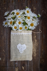 A bouquet of white daisies.
