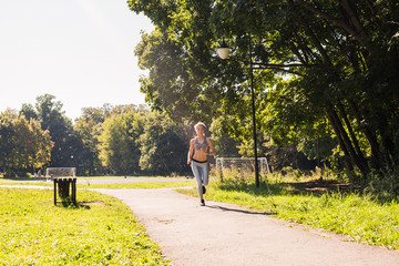 healthy lifestyle young fitness woman running outdoors