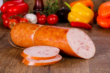 Pork sausages over wooden