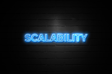 Scalability neon Sign on brickwall