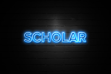 Scholar neon Sign on brickwall