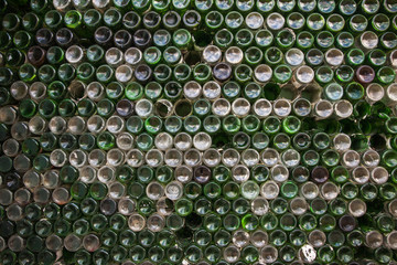 Bottom of the bottle texture. Glass,Dirty empty wine bottles close-up,Bottom of green bottle pattern background