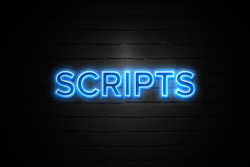 Scripts neon Sign on brickwall