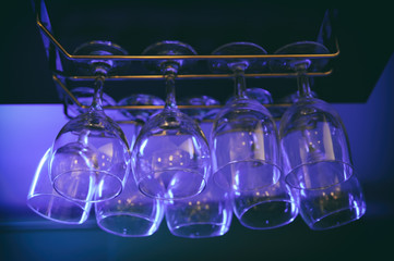 Hanging Wine Glasses In A Bar