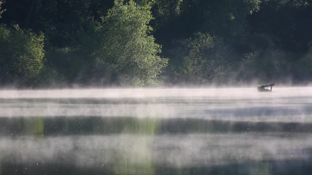 morning lake and fog after sunrise