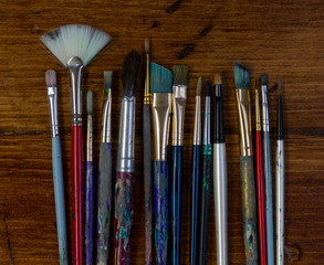 Paint Brushes on Wooden Table