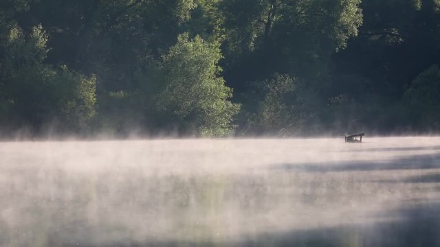 morning lake and fog after sunrise