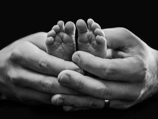 Baby Feet and Father's hands