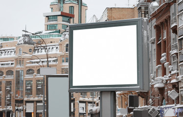 Blank advertising board on city street