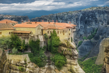 Fototapeta na wymiar Beautiful and traditional Christian monastery in retro color in Meteora region, Greece