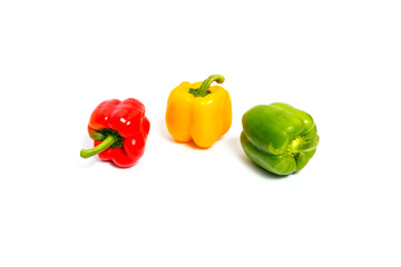 Fresh vegetables Three sweet Red, Yellow, Green Peppers isolated on white background.