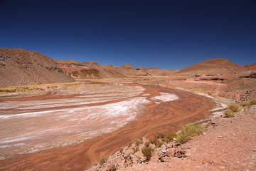Riverbed of a red river in Argentina