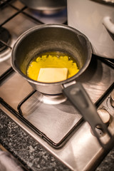 Butter melting in a hot pan