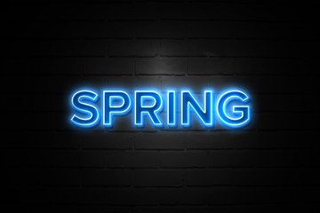 Obraz premium Spring neon Sign on brickwall