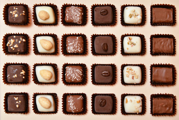 Chocolate candies of different shapes in a box