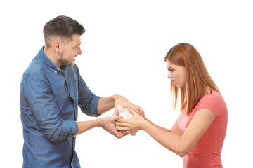 Couple arguing about planning of family budget against white background