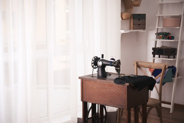 Tailor workshop with old sewing machine