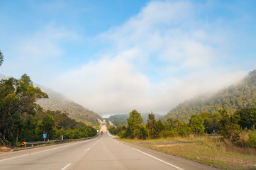 Long countryside road, highway on sunny day