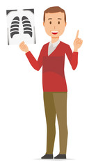 A middle-aged man wearing a sweater has an X-ray picture