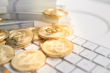Bitcoin with little figure on keyboard