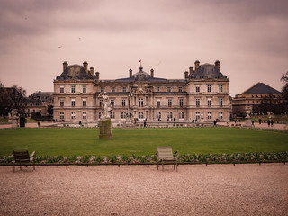 Fototapeta na wymiar View of the Luxembourg palace, inside the public garden of Luxembourgh, one of the largest in Paris.