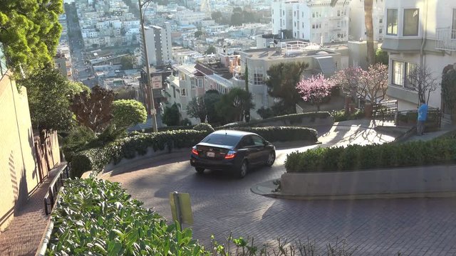 San Francisco. Driving down the "crookedest" street in the world -- Lombard Street - the famous tourist destination of San Francisco.