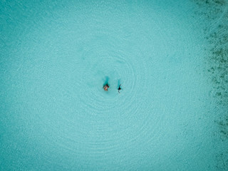 Drone photo of mother and child in Sapodilla Bay, Providenciales, Turks and Caicos