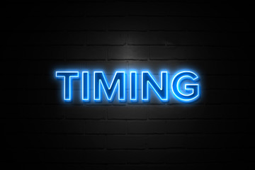 Timing neon Sign on brickwall
