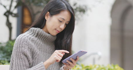 Young woman using mobile phone