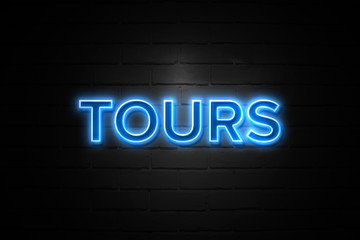 Tours neon Sign on brickwall