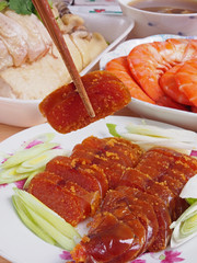 Slices of mullet roe on the white plate