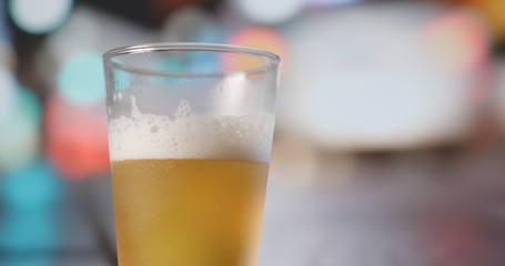 Pouring beer into glass