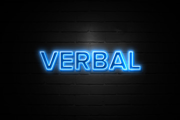 Fototapeta premium Verbal neon Sign on brickwall