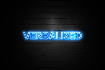 Verbalized neon Sign on brickwall