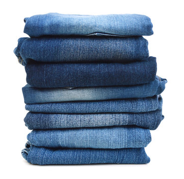 Stack Of Blue Jeans A White Background