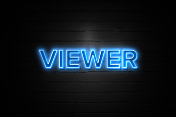 Viewer neon Sign on brickwall