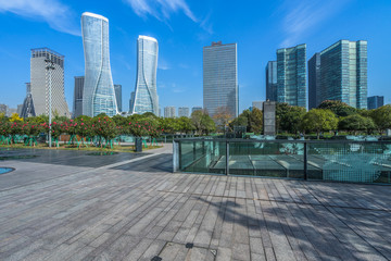 Panoramic skyline and buildings with empty square floor.